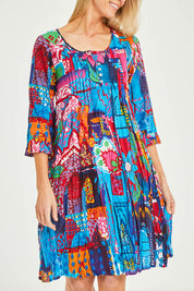 Model Kelly wearing size 10 of the Organic Cotton 3/4 Sleeve Dress in colour Marared (Blue), from the front, cropped image