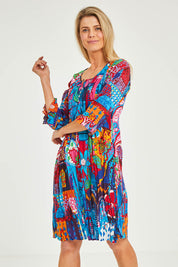 Model Kelly wearing size 10 of the Organic Cotton 3/4 Sleeve Dress in colour Marared (Blue), from the front, cropped image
