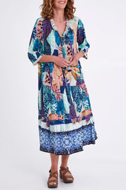 Model Emma wearing size 10 of the Agios Midi Boho Dress in colour Print (Blue), from the front, cropped image