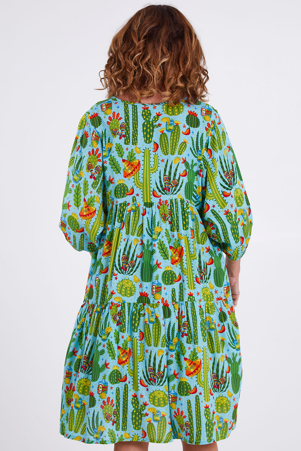 Model Emma wearing size 10 of the El Paso Boho Dress in colour Print (Blue), from the back