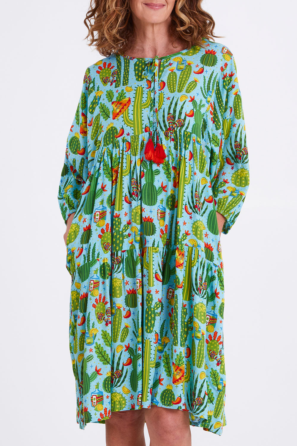 Model Emma wearing size 10 of the El Paso Boho Dress in colour Print (Blue), from the front, cropped image