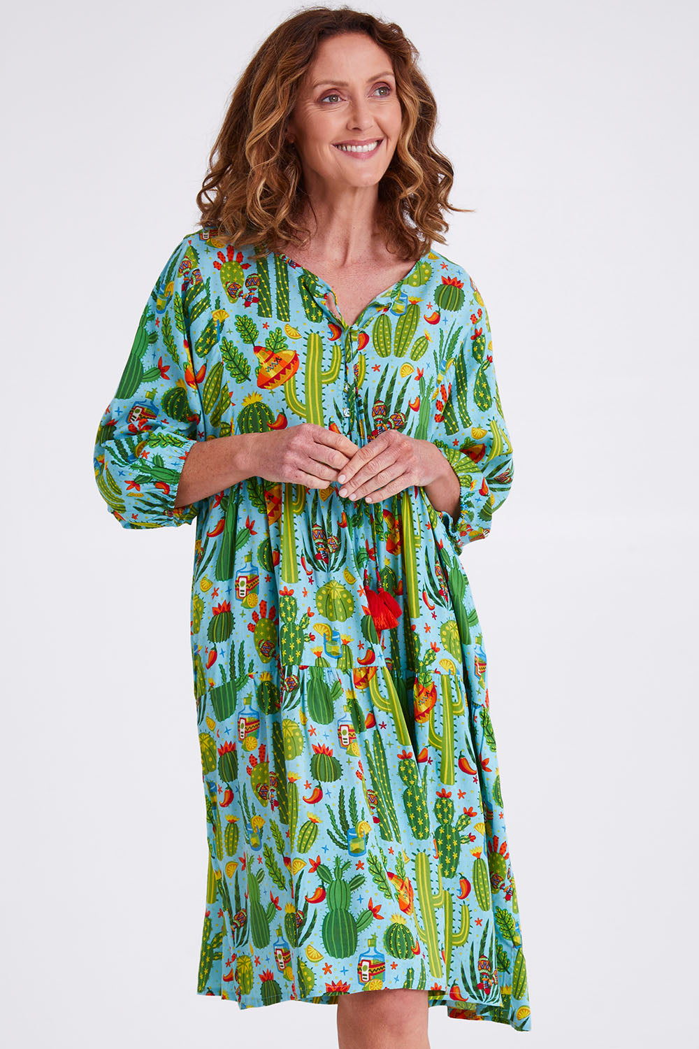 Model Emma wearing size 10 of the El Paso Boho Dress in colour Print (Blue), from the front, cropped image