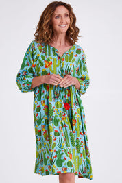 Model Emma wearing size 10 of the El Paso Boho Dress in colour Print (Blue), from the front, cropped image