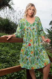 A model wearing the El Paso Boho Dress in colour Print (Blue), from the front, showing the whole outfit