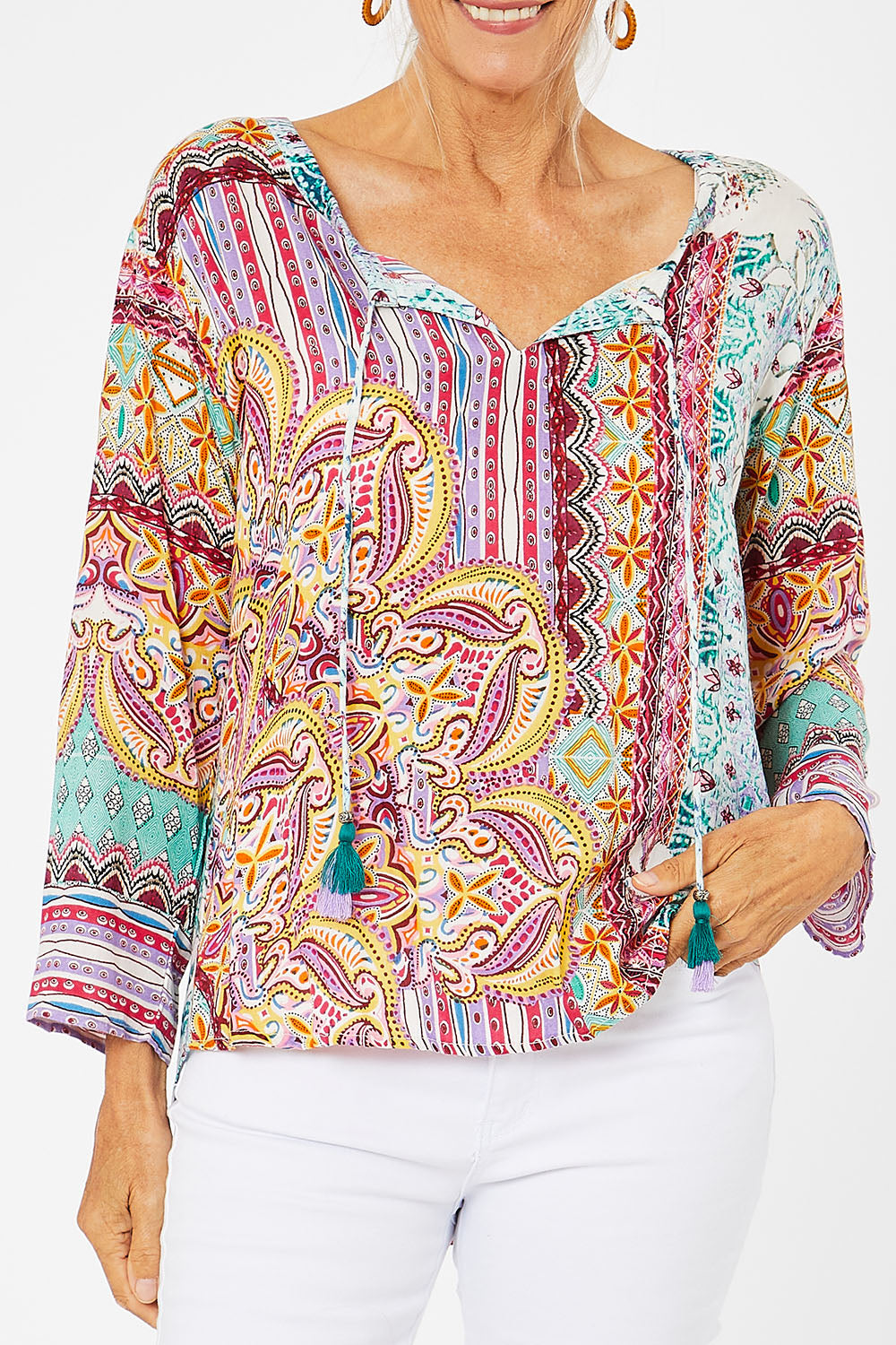 Model Rachel wearing size 10 of the Chateau Print Top in colour Print (Red), from the front, cropped image