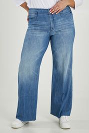 Model Maddy wearing the Higher Rise Teresa Wide Leg in colour Everly (Blue), from the front, cropped image