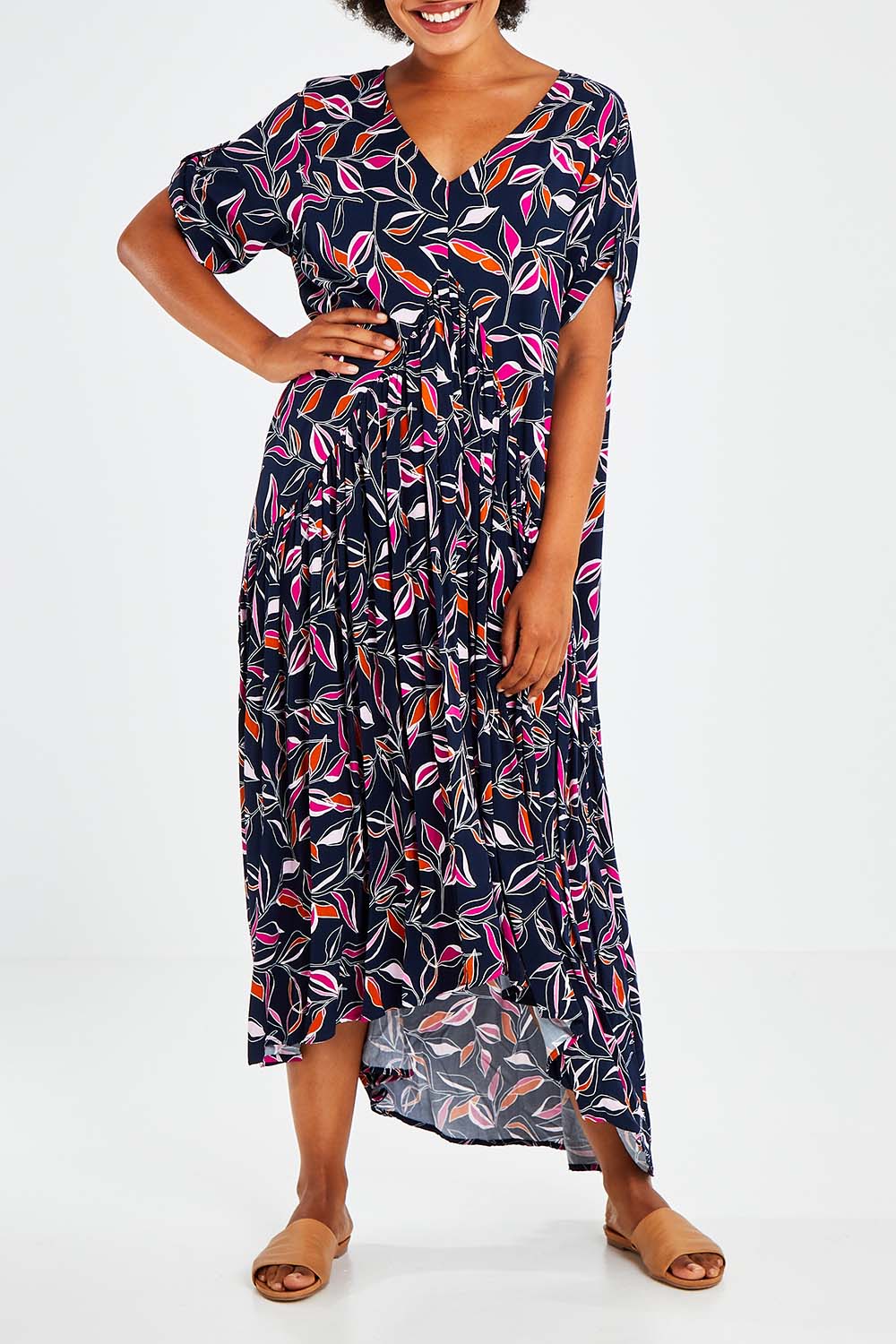Model Olivia wearing the Botanical Night Peak Maxi Dress in colour Botanical (Blue), from the front, cropped image