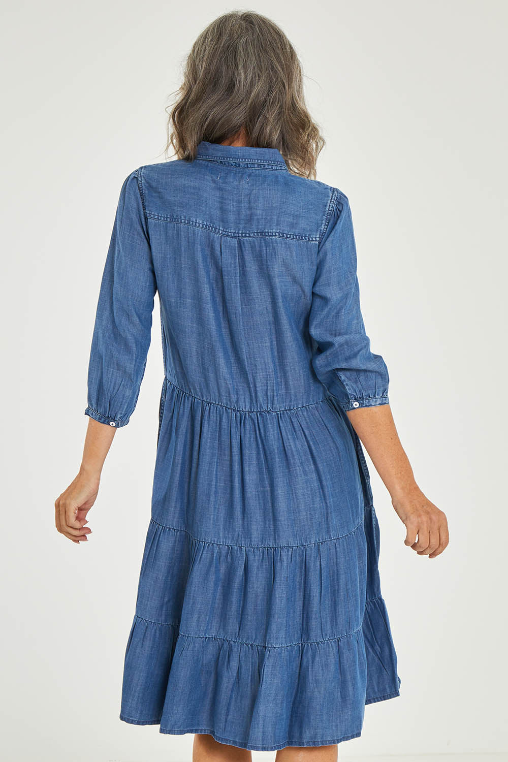 Model Luisa wearing size 10 of the Aubree Dress in colour Blue (Blue), from the back