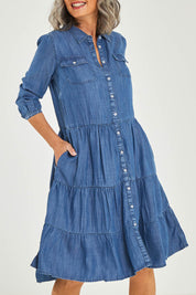 Model Luisa wearing size 10 of the Aubree Dress in colour Blue (Blue), from the front, cropped image