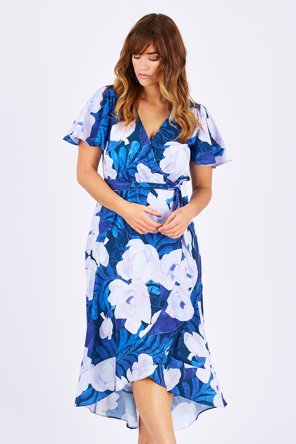 Model Laura wearing size 12 of the Adoria Dress in colour NavyWhite (Blue), from the front, cropped image