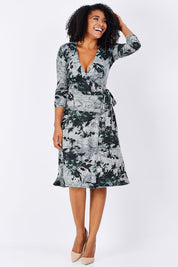 Model Grazi wearing size S of the Betty Wrap Dress in colour Print (Black), from the front, showing the whole outfit