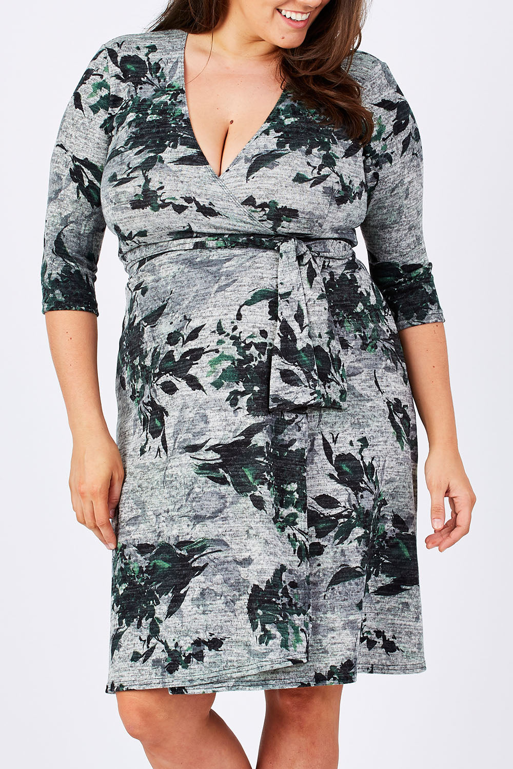 Model Mae wearing size XL of the Betty Wrap Dress in colour Print (Black), from the front, cropped image