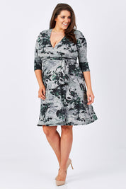 Model Mae wearing size XL of the Betty Wrap Dress in colour Print (Black), from the front, showing the whole outfit