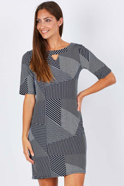 Model Anna wearing size S of the Laney Shift Dress in colour Navy (Blue), from the front, cropped image