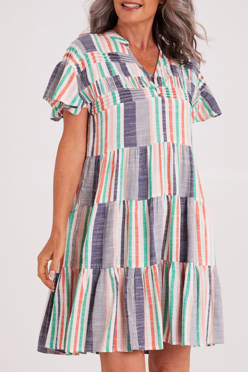 Model Luisa wearing size S of the Sway Dress in colour Multi (Blue), from the front, cropped image