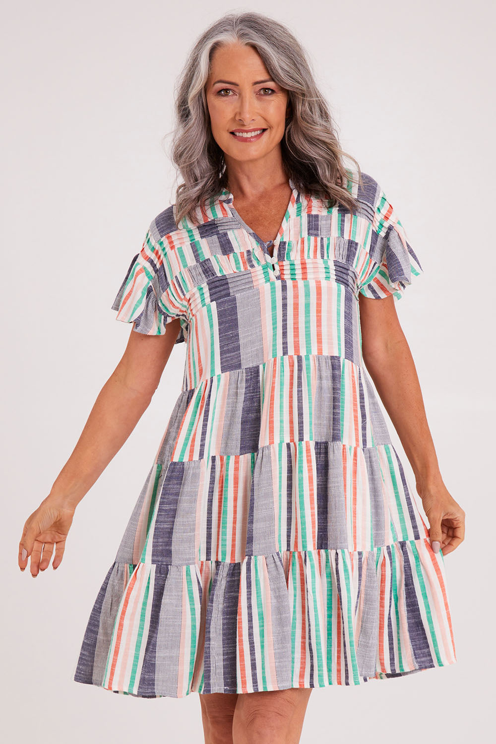 Model Luisa wearing size S of the Sway Dress in colour Multi (Blue), from the front, cropped image