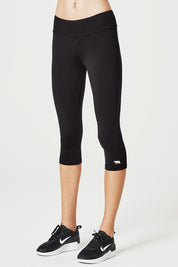 A model wearing the High Rise 3/4 Tight in colour Black (Black), from the front, cropped image