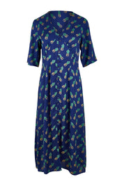 Product shot of the Frenchie Dress in colour Pinapples (Blue), from the front
