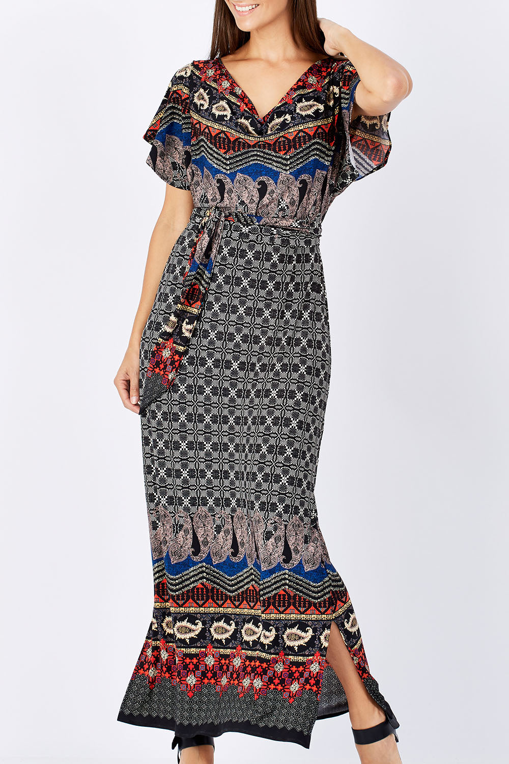 Model Anna wearing size 10 of the Villia Lina Maxi in colour BorderPrnt (Grey), from the front, cropped image