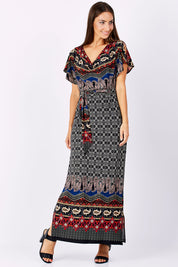 Model Anna wearing size 10 of the Villia Lina Maxi in colour BorderPrnt (Grey), from the front, showing the whole outfit