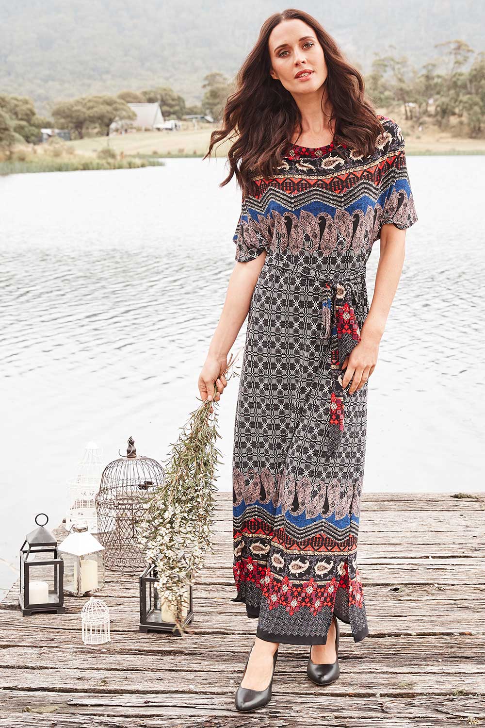Model Clementine wearing size 10 of the Villia Lina Maxi in colour BorderPrnt (Grey), from the front, showing the whole outfit