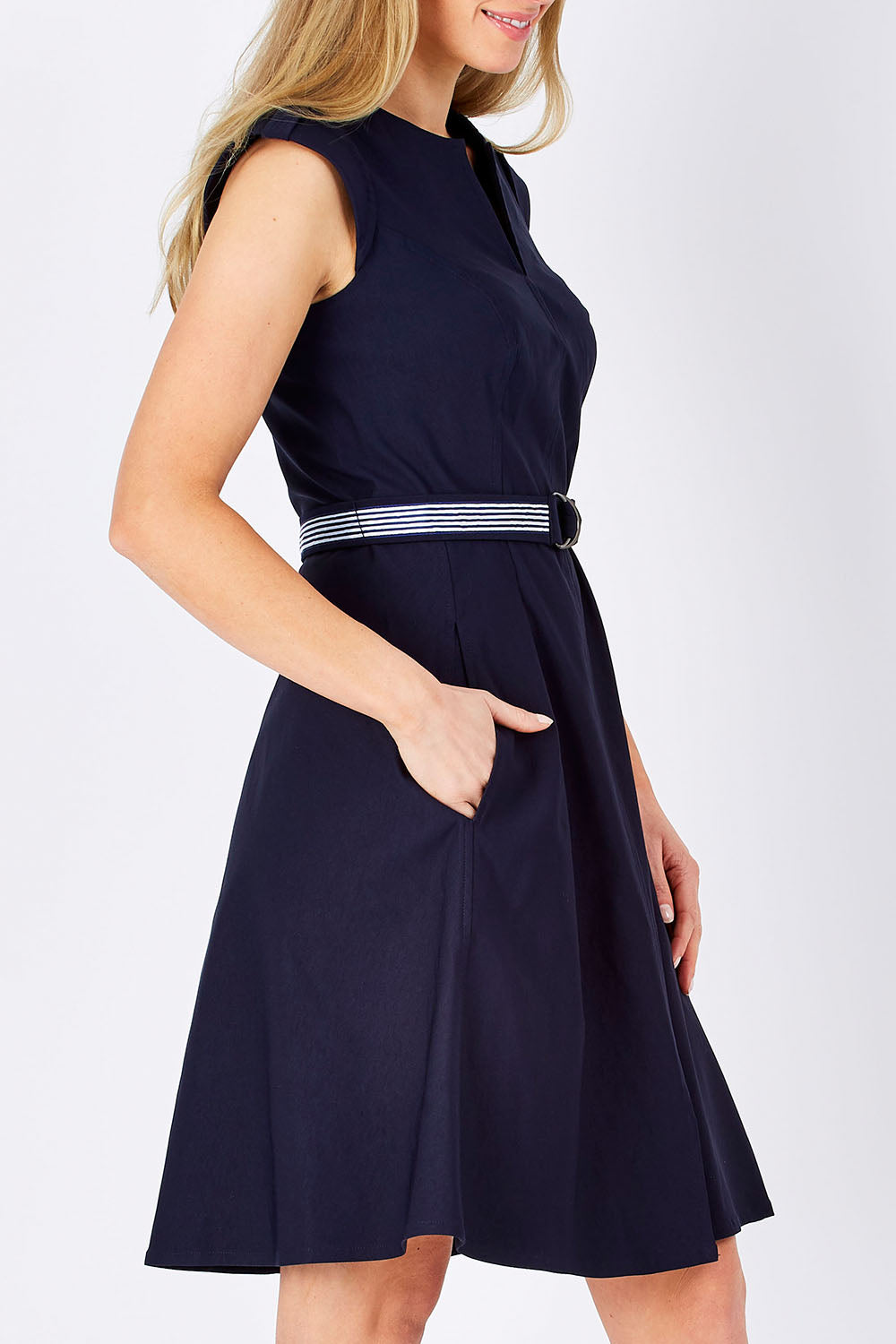 Model Maddy wearing size 10 of the Fit & Flare Belted Dress in colour Navy (Blue), from the front, cropped image