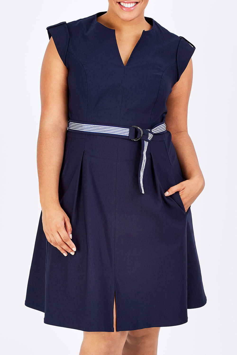 Model Shareefa wearing size 18 of the Fit & Flare Belted Dress in colour Navy (Blue), from the front, cropped image