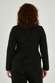 Model Maddy wearing size 16 of the Front Zip Peplum Jacket in colour Black (Black), from the back