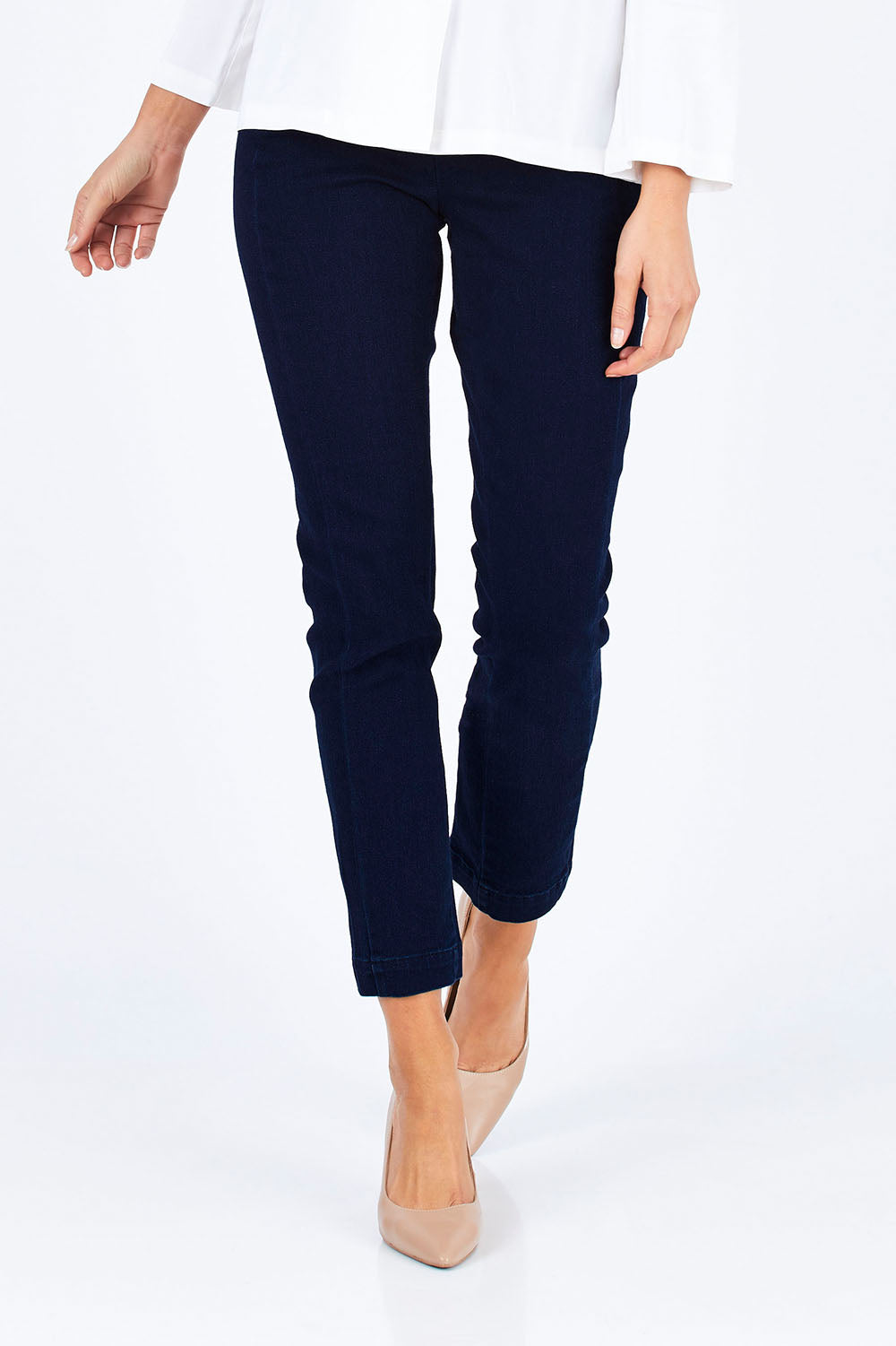 Model Madeline wearing size 10 of the High Rise Ankle Grazier Jeans in colour Denim (Blue), from the front, cropped image