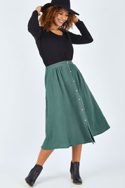 Model Summer wearing size 10 of the Lost Dreams Buttoned Skirt in colour Forest (Green), from the front, showing the whole outfit