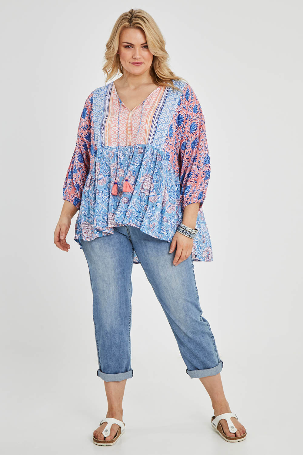 Model Keeara wearing size 16 of the Rosebud Beach Blouse in colour Coralblue (Blue), from the front, showing the whole outfit