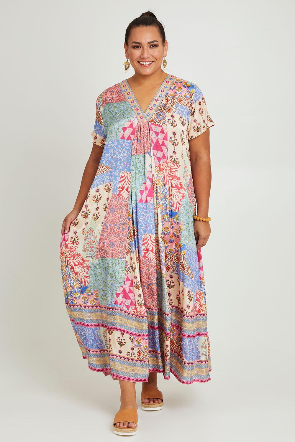 Model Ashleigh wearing size 16 of the Mindil Beach Maxi Dress in colour Patchwork, from the front, showing the whole outfit