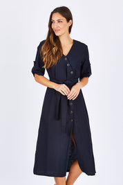 Model Anna wearing size 10 of the Button Detailed Mid Length Dress in colour Navy (Blue), from the front, cropped image