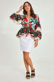 Model Madeline wearing the Cha Cha Top in colour Toledo (Black), from the front, showing the whole outfit