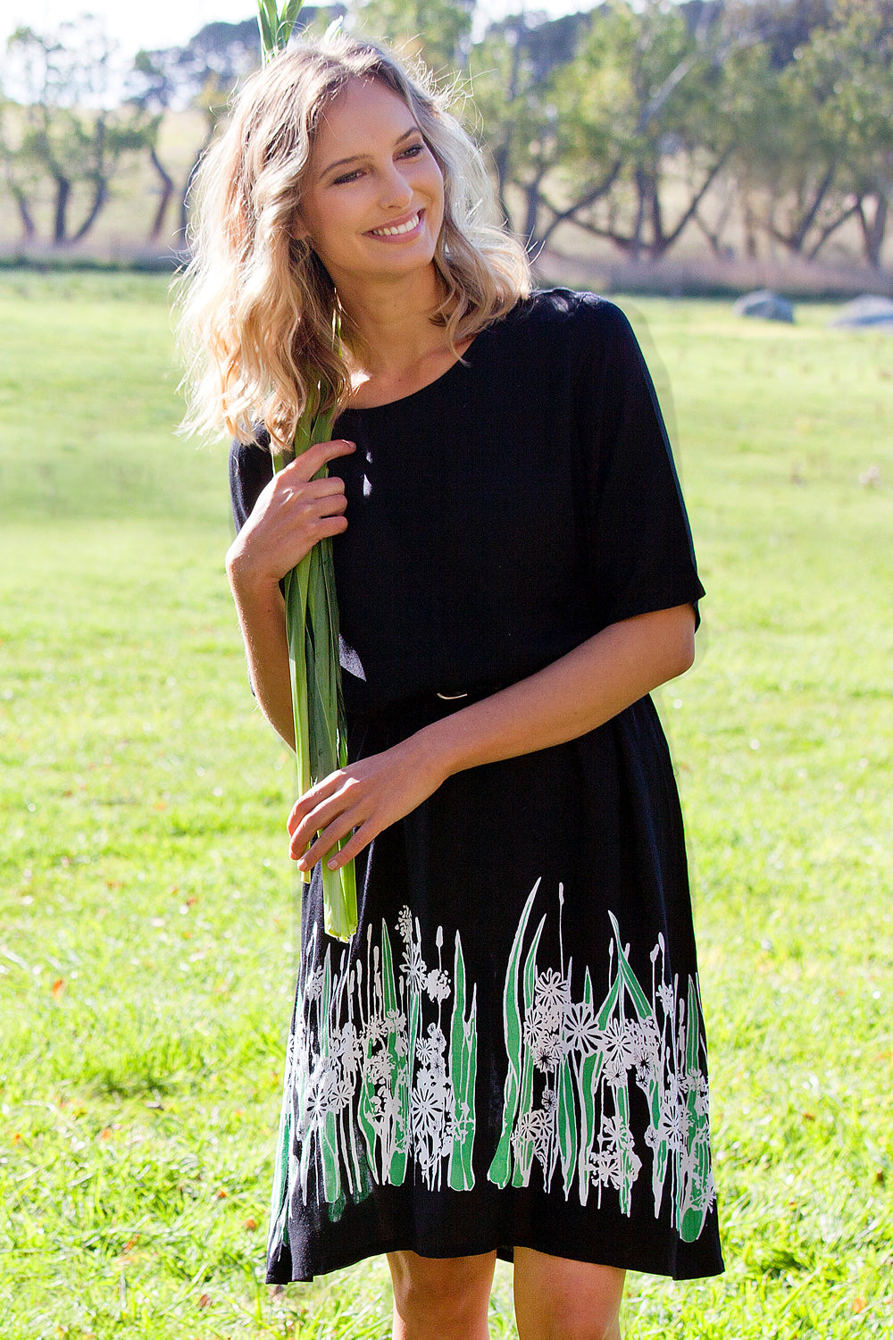 Model Alex wearing size 10 of the Robbie Shift Dress Summer Meadow in colour JetBlack (Black), from the front, showing the whole outfit