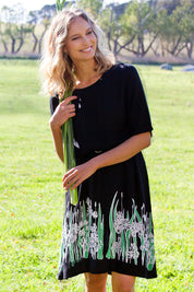 Model Alex wearing size 10 of the Robbie Shift Dress Summer Meadow in colour JetBlack (Black), from the front, showing the whole outfit