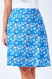 Model Laura wearing size 12 of the Adele Ain colourline Skirt Fruit Punch - Blue (Blue), from the front, cropped image