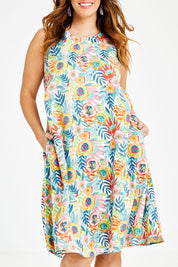 Model Laura wearing size 14 of the Zoey Shift Dress in colour Meadow (Blue), from the front, cropped image
