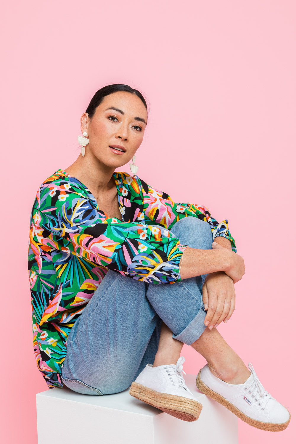 Model Katie wearing size 10 of the Julia 3/4 Sleeve Top in colour Rainforest (Blue), from the front, showing the whole outfit