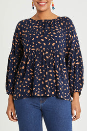Model Noli wearing size 14 of the Dianna Blouse in colour Spot (Blue), from the front, cropped image