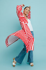 Model Katie wearing size 10 of the Abby Shirt Dress in colour Patchwork (Red), from the front, showing the whole outfit