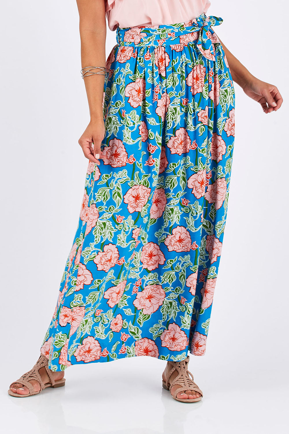 Model Thais wearing size 10 of the Loretta Maxi Skirt Mojito in colour Blue (Blue), from the front, cropped image