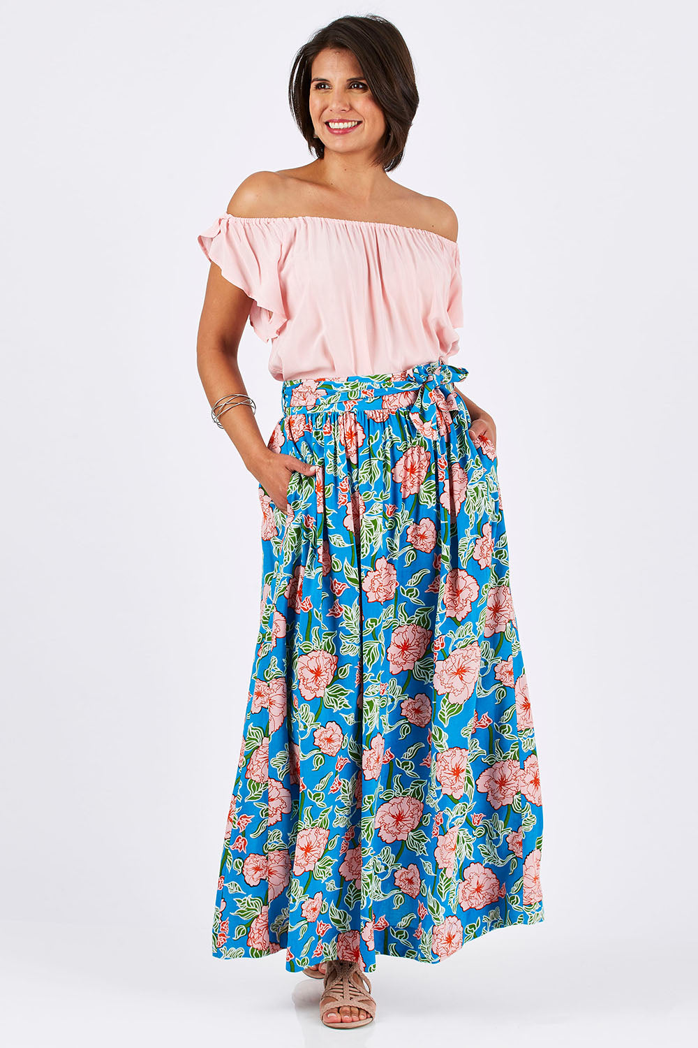 Model Thais wearing size 10 of the Loretta Maxi Skirt Mojito in colour Blue (Blue), from the front, showing the whole outfit