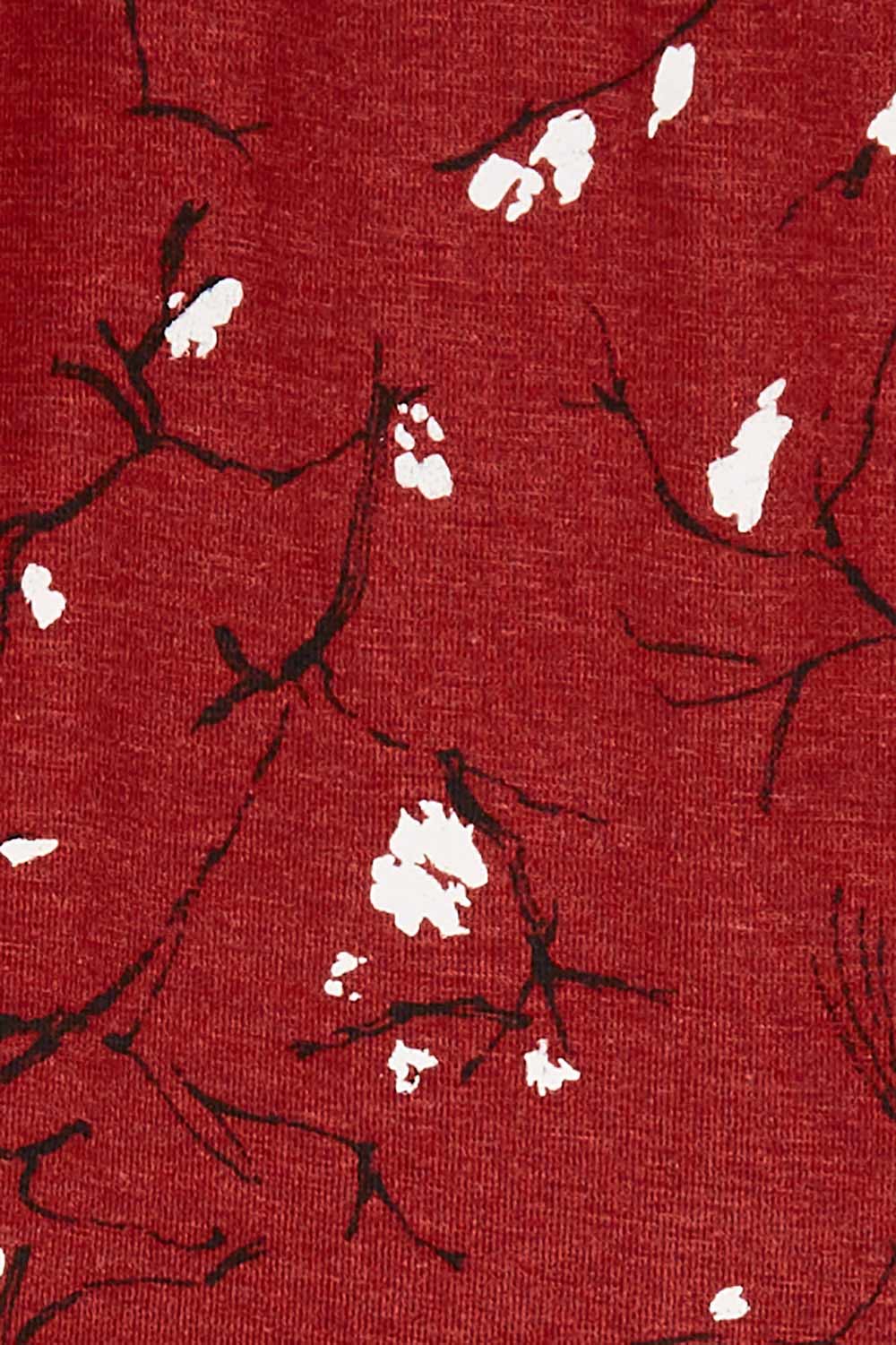 Product shot of the Eria Bamboo Wrap Dress in colour Oranrust (Red), detail