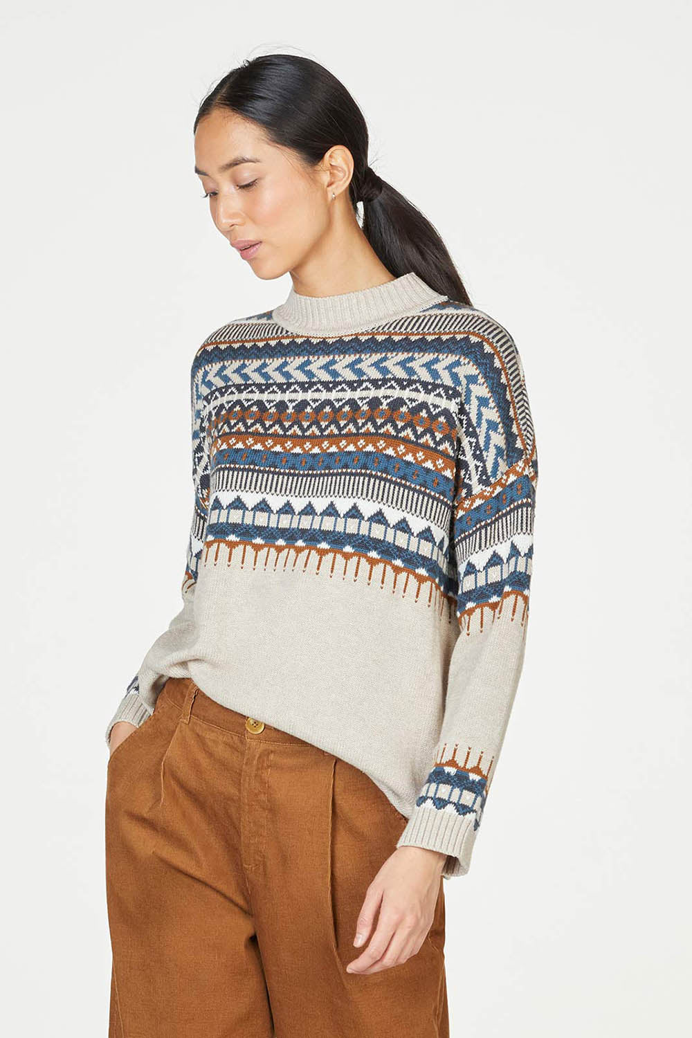 A model wearing the Delilah Fairisle Jumper in colour Vanilla (White), from the front, cropped image