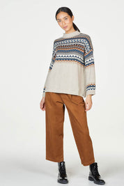 A model wearing the Delilah Fairisle Jumper in colour Vanilla (White), from the front, showing the whole outfit