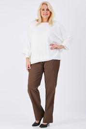 Model Natalie wearing size XL of the Layer Top in colour White (White), from the front, showing the whole outfit