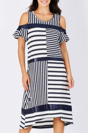 Model Monika wearing size S of the Star Stripe Dress in colour NavyWhite (Blue), from the front, cropped image