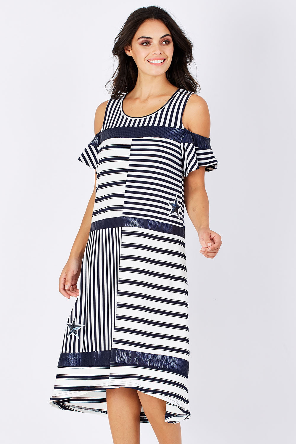 Model Monika wearing size S of the Star Stripe Dress in colour NavyWhite (Blue), from the front, cropped image