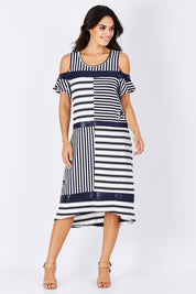 Model Monika wearing size S of the Star Stripe Dress in colour NavyWhite (Blue), from the front, showing the whole outfit